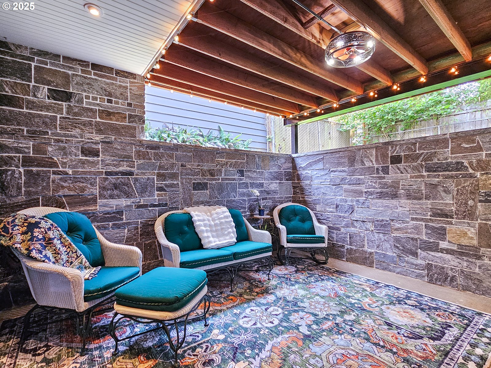 4725 Northeast 22nd Avenue Portland, OR 97211 - Photo 40 of 46 a outdoor living space with furniture and a fireplace