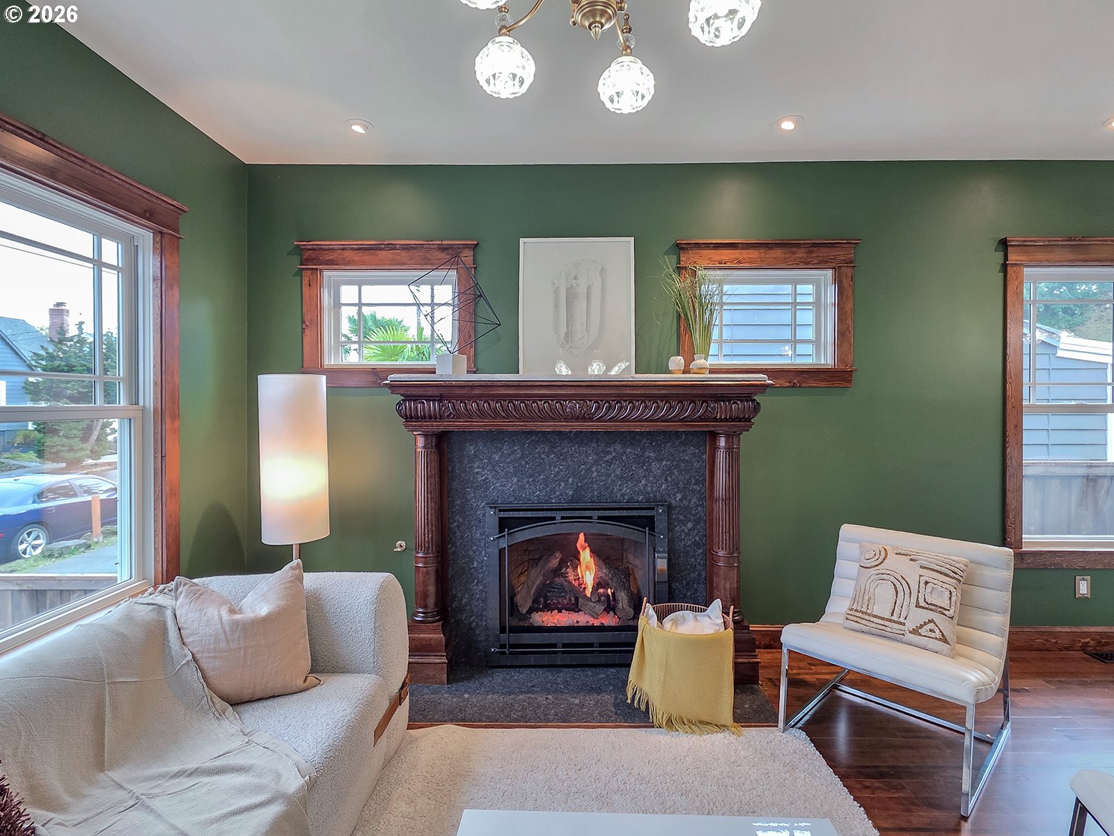 4725 Northeast 22nd Avenue Portland, OR 97211 - Photo 4 of 46 a living room with furniture and a fireplace