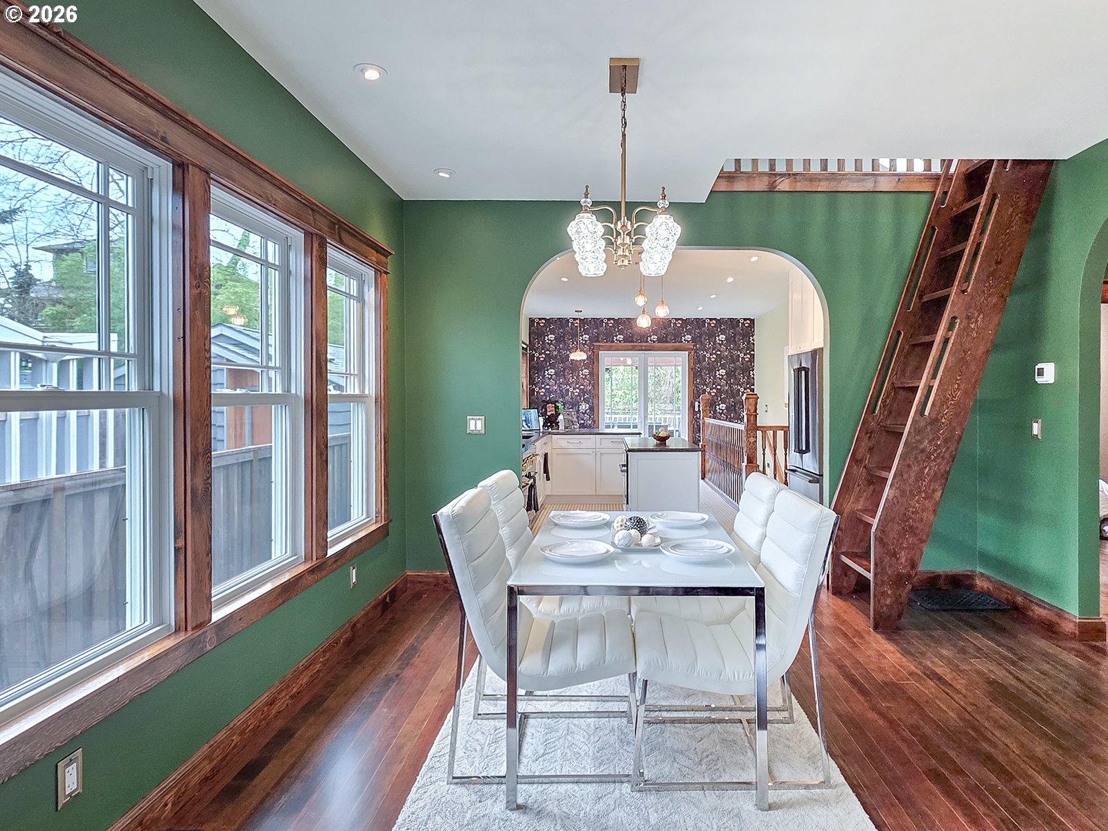 4725 Northeast 22nd Avenue Portland, OR 97211 - Photo 6 of 46 a view of a dining room with furniture window and wooden floor