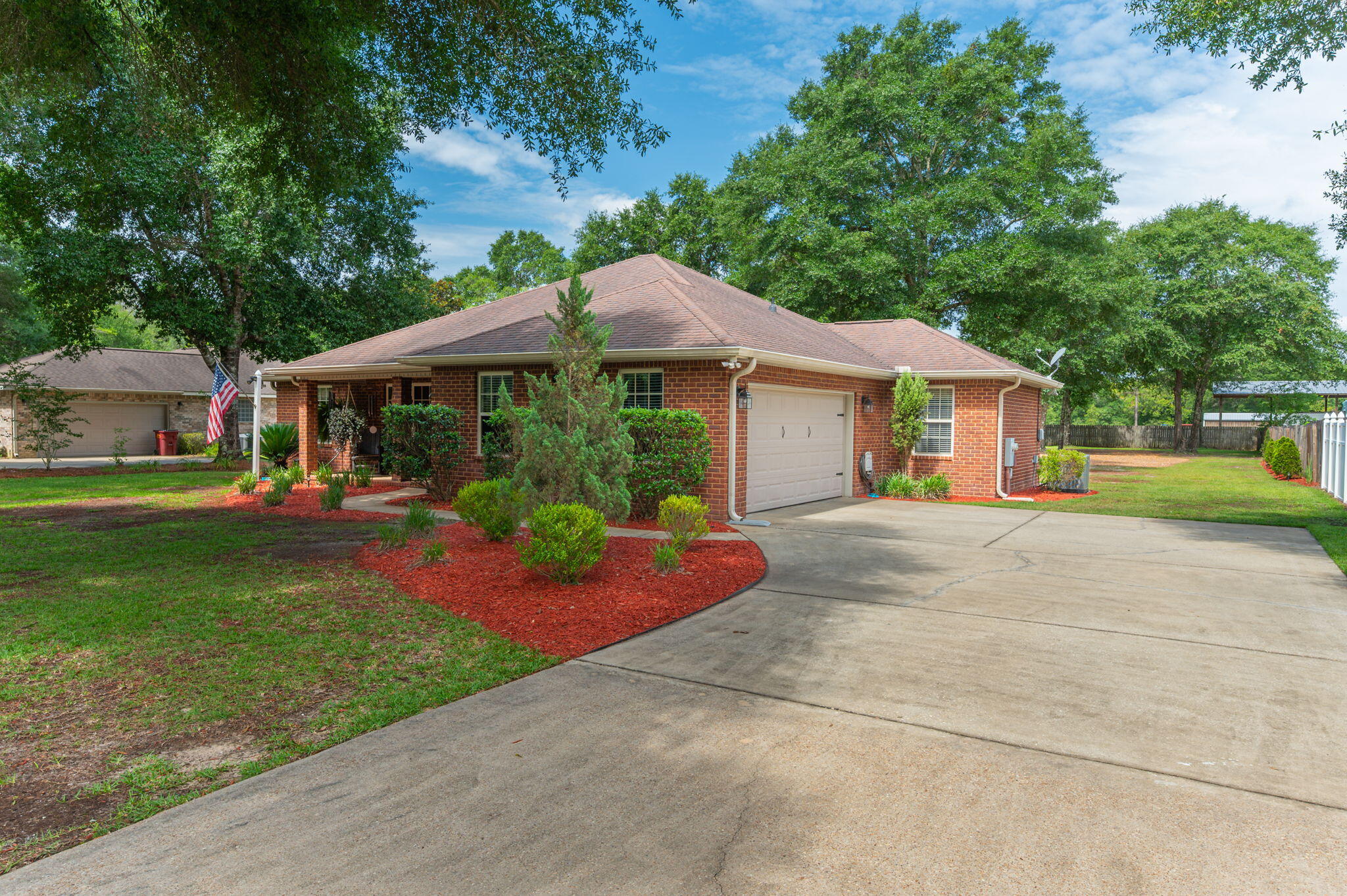 4216 Painter Branch Road Crestview, FL 32539 - Photo 3 of 38 Two car side entry garage