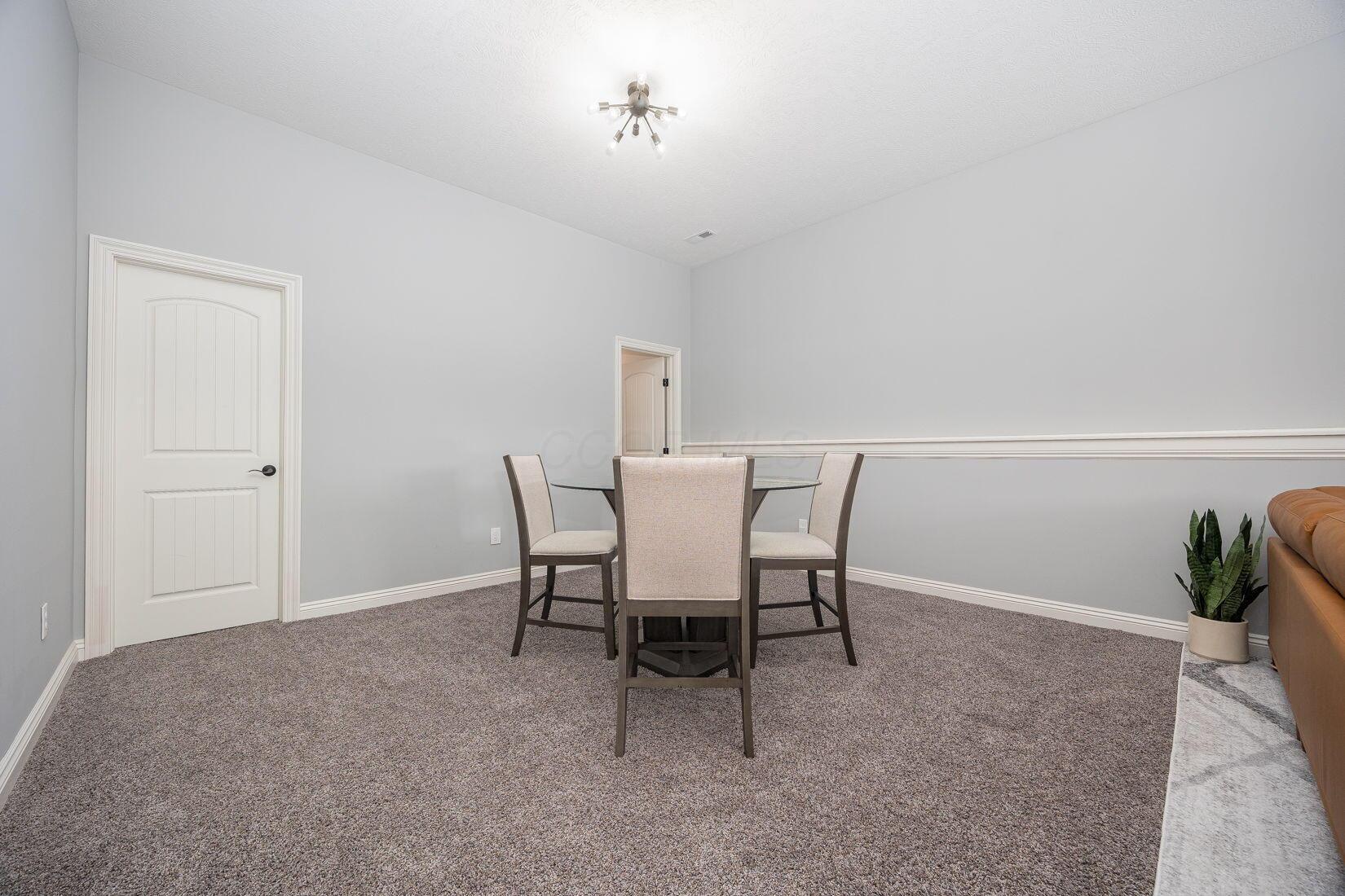 4908 South Section Line Road Delaware, OH 43015 - Photo 31 of 99 Mid level living space with full bath