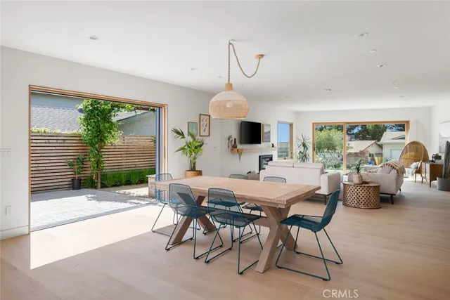 a kitchen with a stove a sink and a window