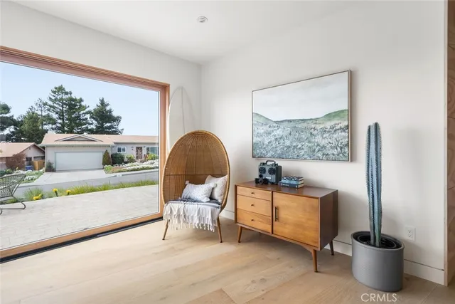 a view of front door with wooden floor