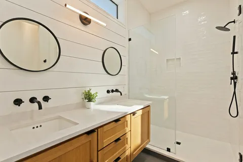 a bathroom with a sink and a shower