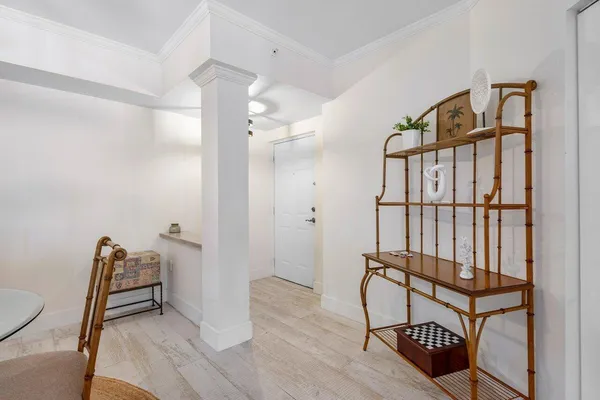 a view of a swimming pool with chairs