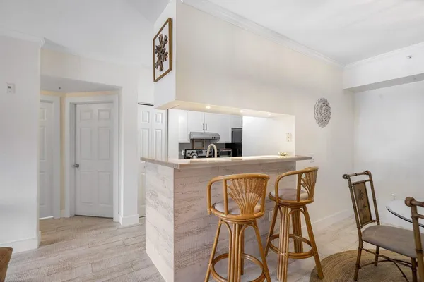 a living room with fireplace furniture and a flat screen tv