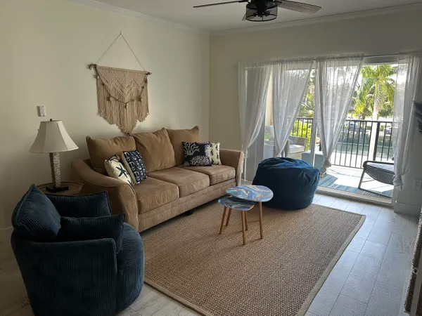 an aerial view of a house with outdoor space lake view and lake view