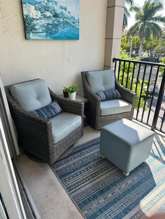 a kitchen with stainless steel appliances granite countertop a stove a refrigerator and a refrigerator