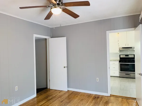 a view of a bathroom from a hallway