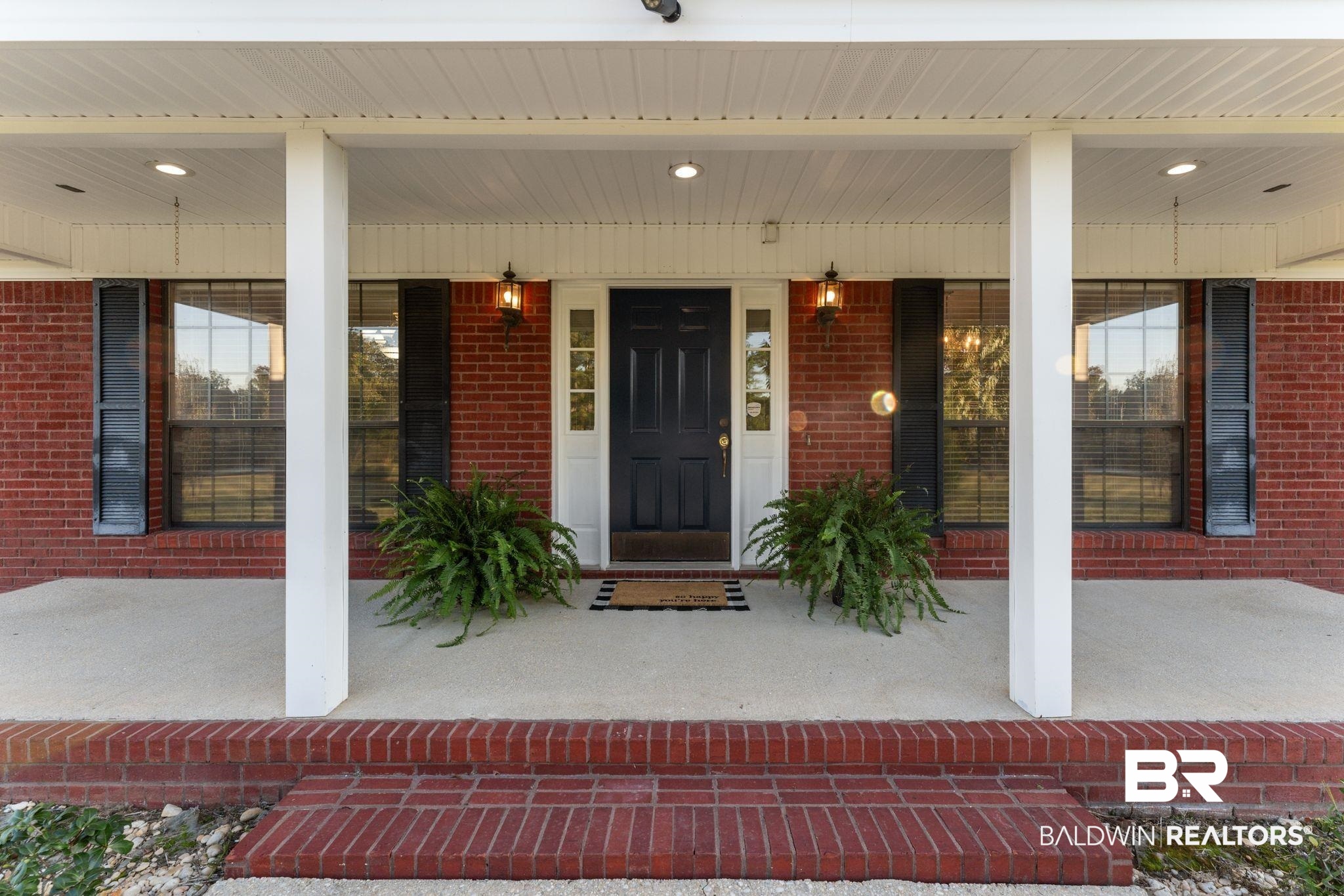 888 Mobile Cut-Off Road St. Stephens, AL 36569 - Photo 9 of 54 Entrance to property featuring covered porch and brick siding