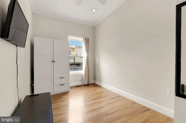 a bathroom with a sink vanity and a mirror