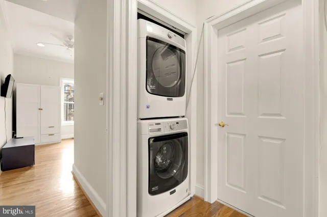 a bathroom with a shower curtain and a bath tub