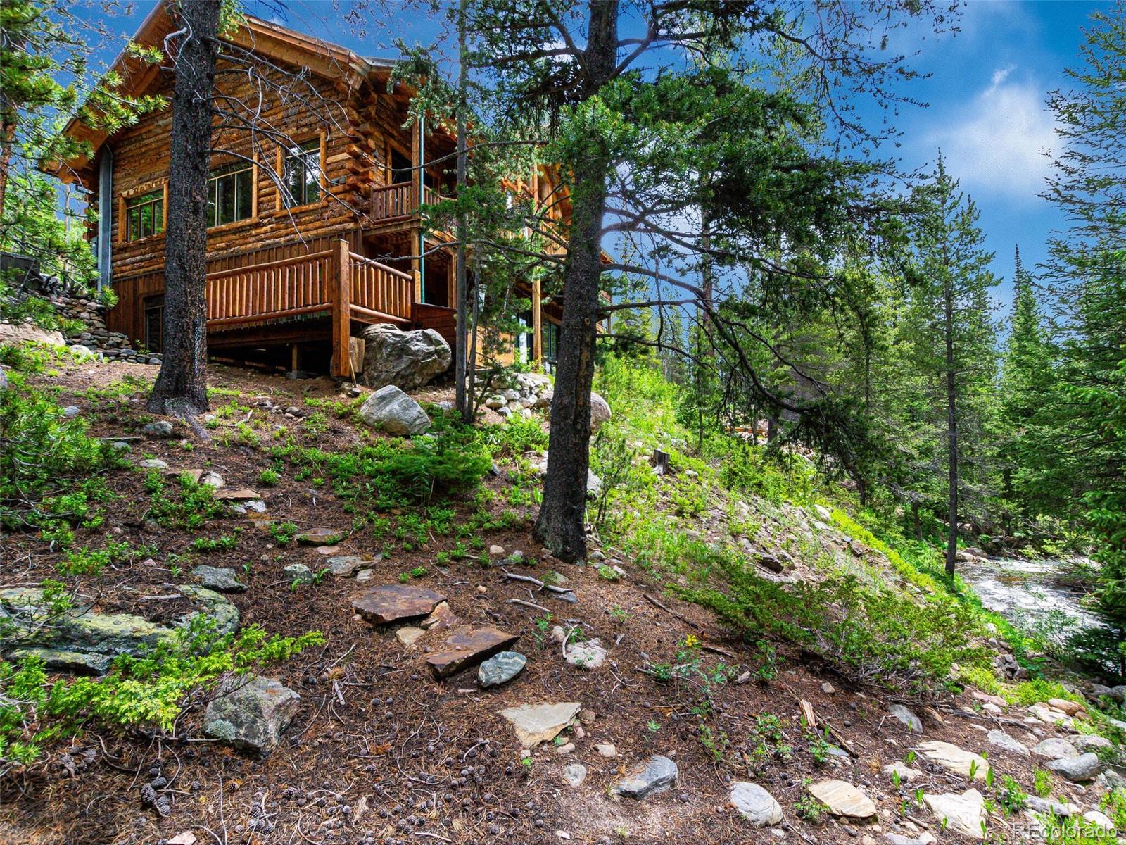 a view of a house with a tree