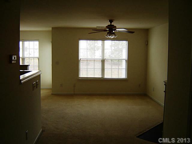 11638 Rabbit Ridge Road, Unit 11638 Charlotte, NC 28270 - Photo 3 of 15 a view of an empty room with a window