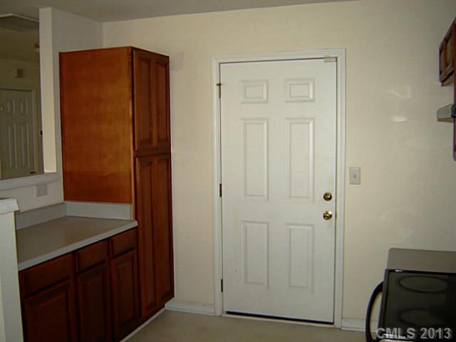11638 Rabbit Ridge Road, Unit 11638 Charlotte, NC 28270 - Photo 7 of 15 a bathroom with a sink and a mirror