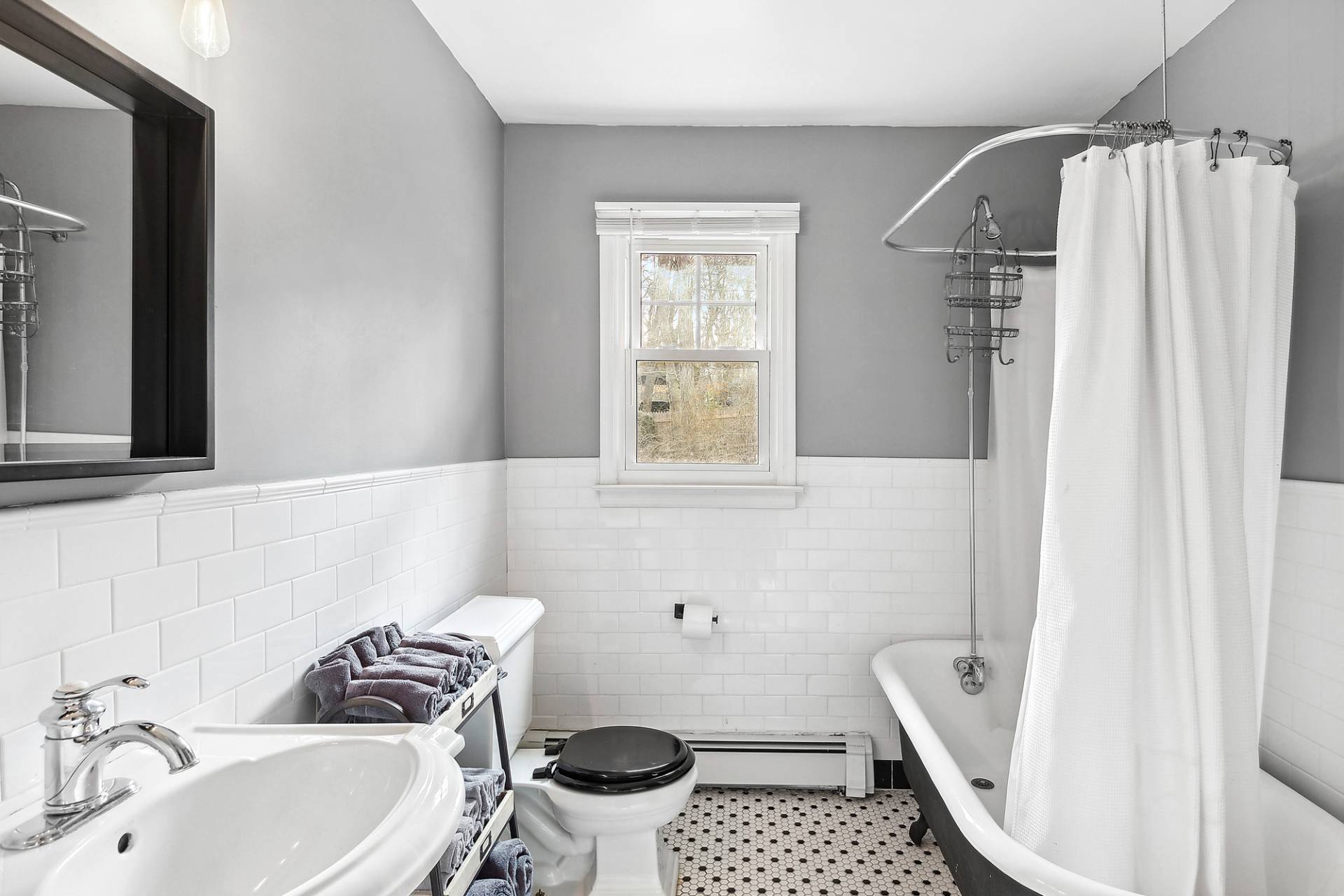 3 Dayton Avenue East Hampton, NY 11937 - Photo 3 of 15 a bathroom with a sink toilet and shower