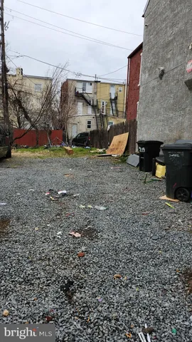 a view of a car parked in front of a house