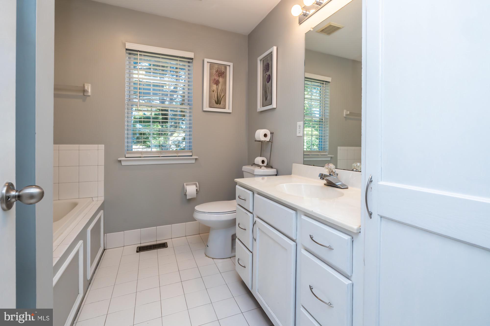 31 North Hawthorne Road Coatesville, PA 19320 - Photo 20 of 41 a bathroom with a sink toilet and vanity