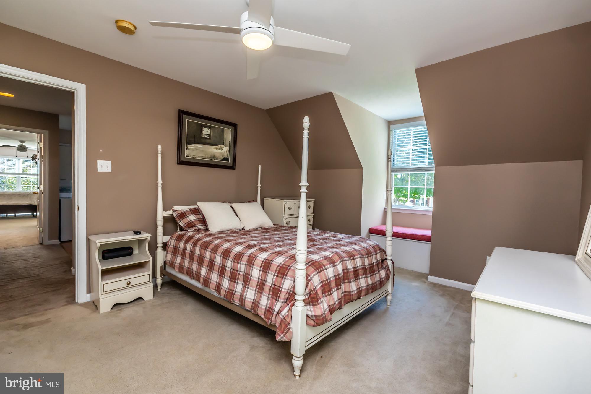 31 North Hawthorne Road Coatesville, PA 19320 - Photo 23 of 41 a bedroom with a bed and a chandelier