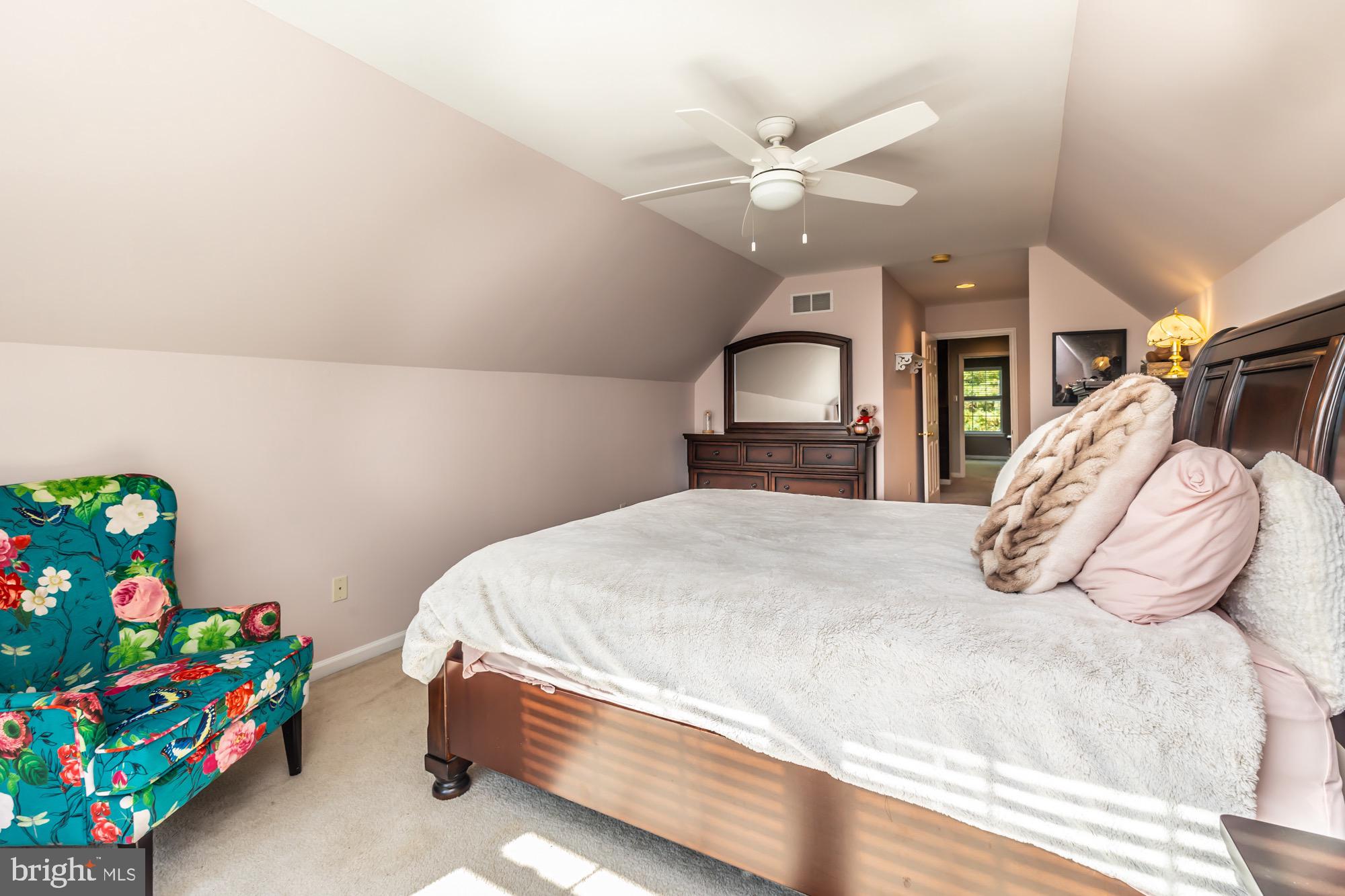31 North Hawthorne Road Coatesville, PA 19320 - Photo 32 of 41 a bedroom with a bed and a chandelier