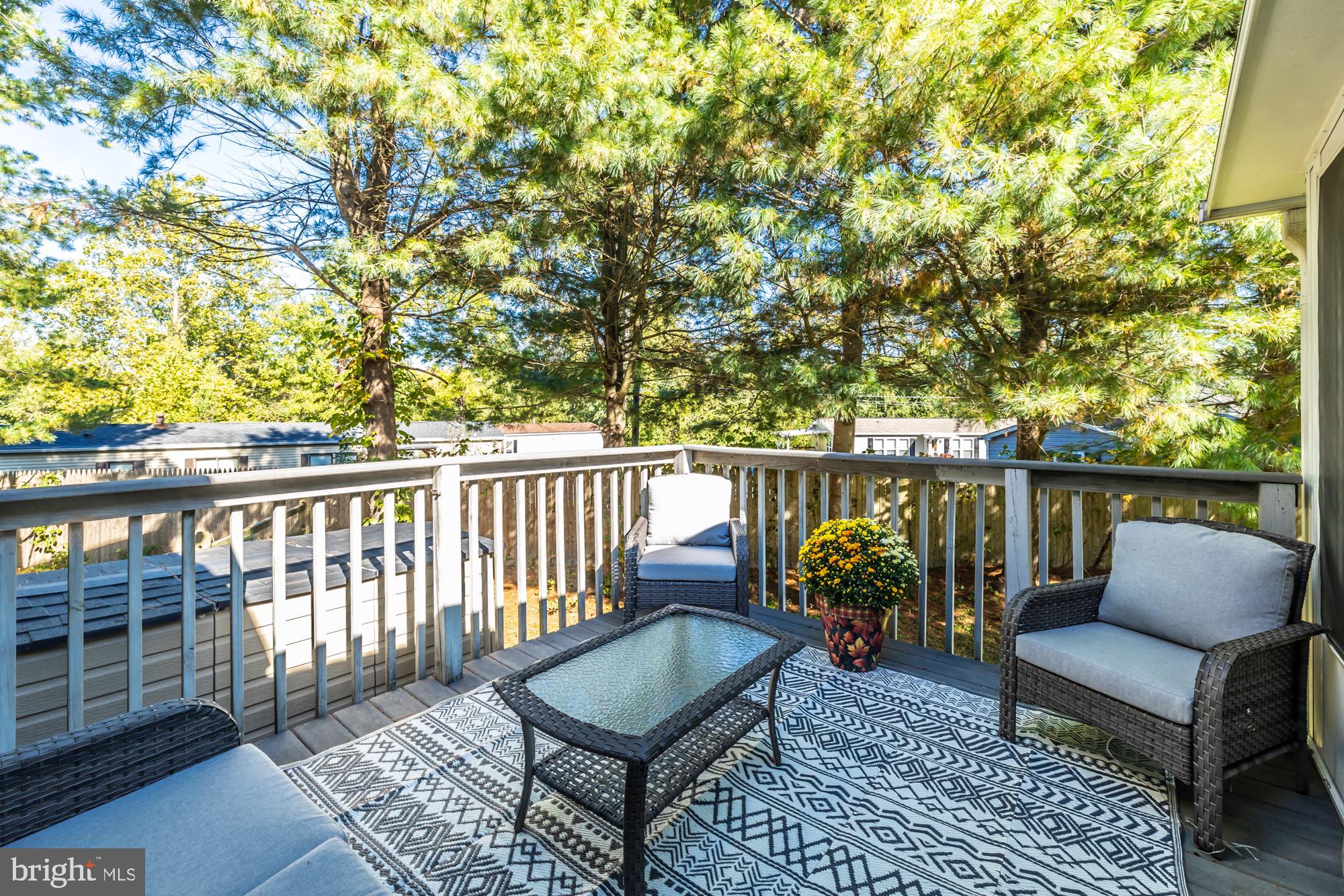 31 North Hawthorne Road Coatesville, PA 19320 - Photo 36 of 41 a balcony with wooden floor and outdoor seating