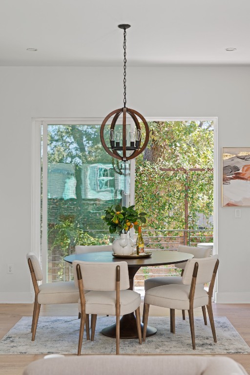 2105 Enfield Road, Unit A Austin, TX 78703 - Photo 14 of 38 a dining room with furniture window and outside view