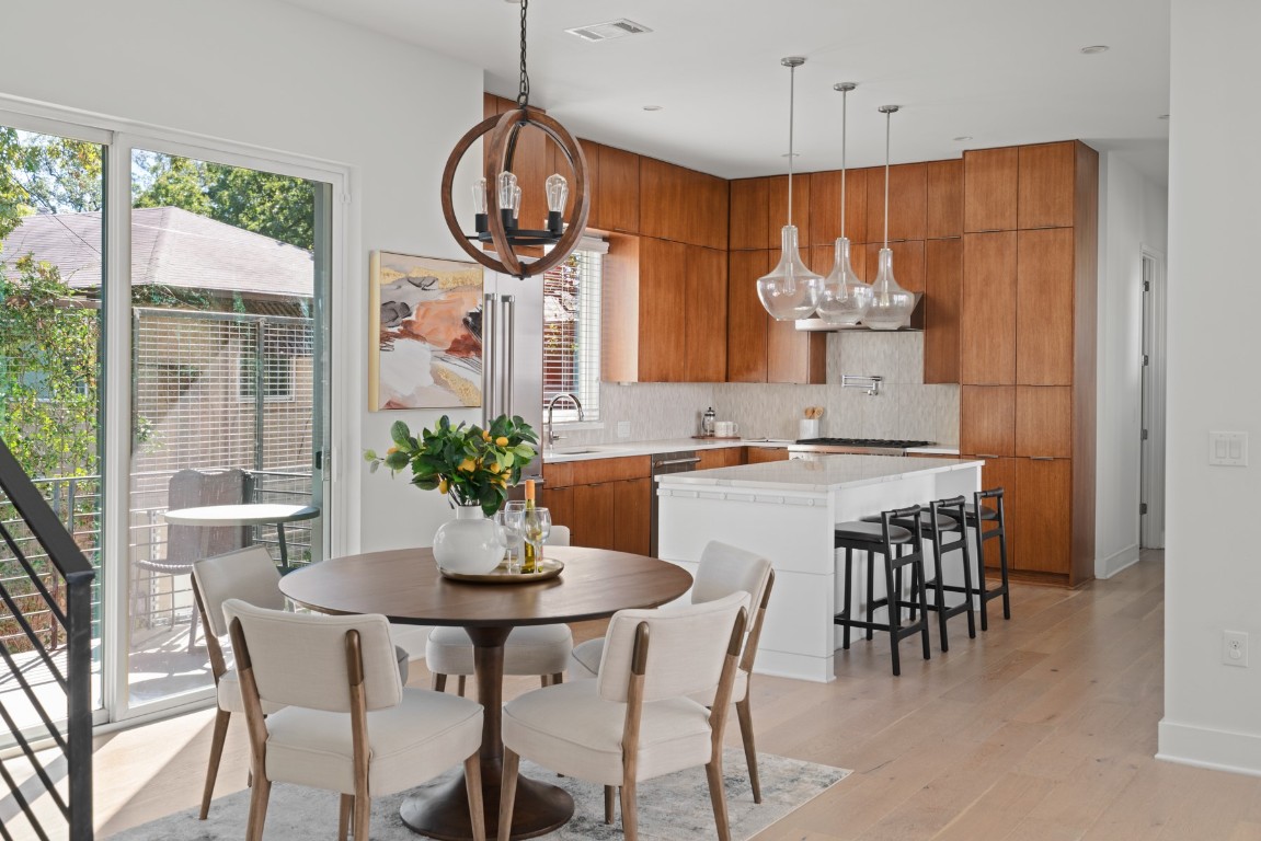 2105 Enfield Road, Unit A Austin, TX 78703 - Photo 18 of 38 a view of a dining room with furniture window and outside view