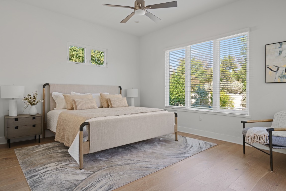 2105 Enfield Road, Unit A Austin, TX 78703 - Photo 19 of 38 a bedroom with a bed and a window