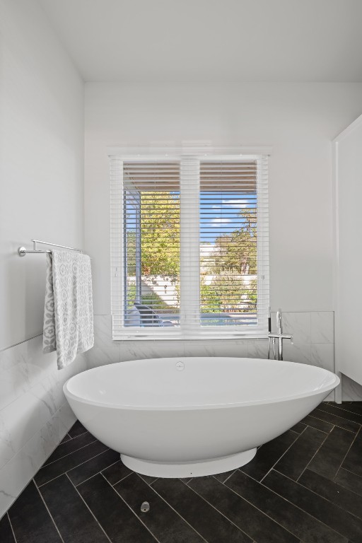 2105 Enfield Road, Unit A Austin, TX 78703 - Photo 22 of 38 a room with wooden floor and a window