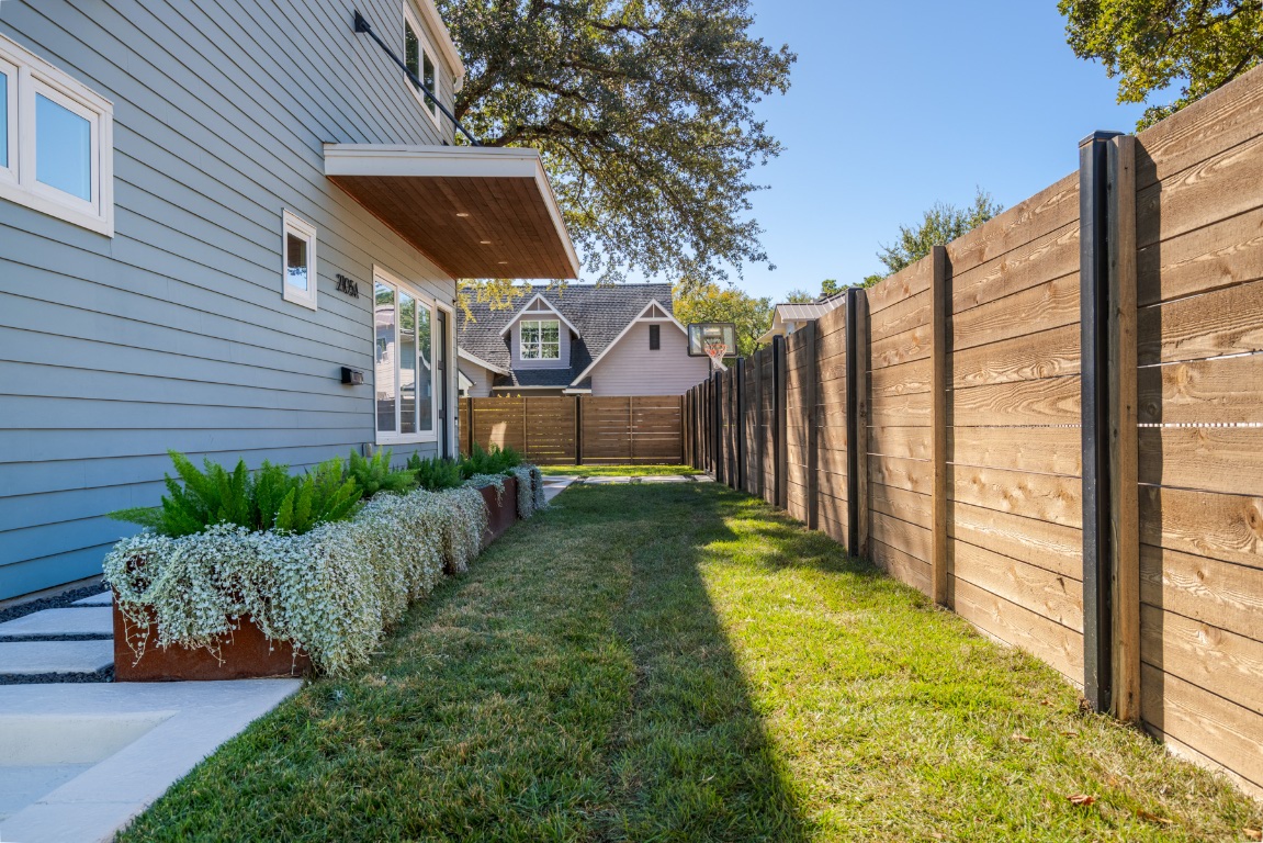 2105 Enfield Road, Unit A Austin, TX 78703 - Photo 32 of 38 a front view of a house with garden