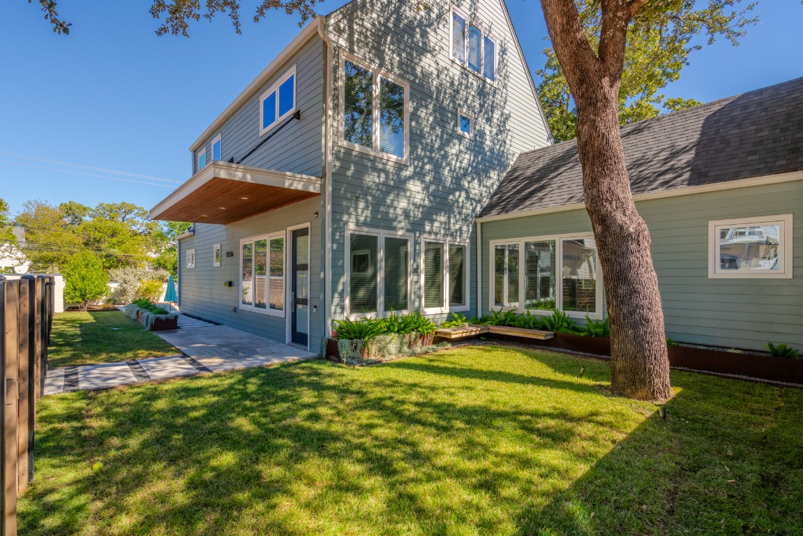 2105 Enfield Road, Unit A Austin, TX 78703 - Photo 5 of 38 a view of a house with backyard and sitting area