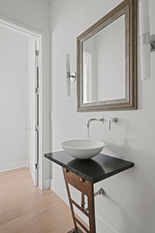 2105 Enfield Road, Unit A Austin, TX 78703 - Photo 10 of 38 a bathroom with a sink and a mirror