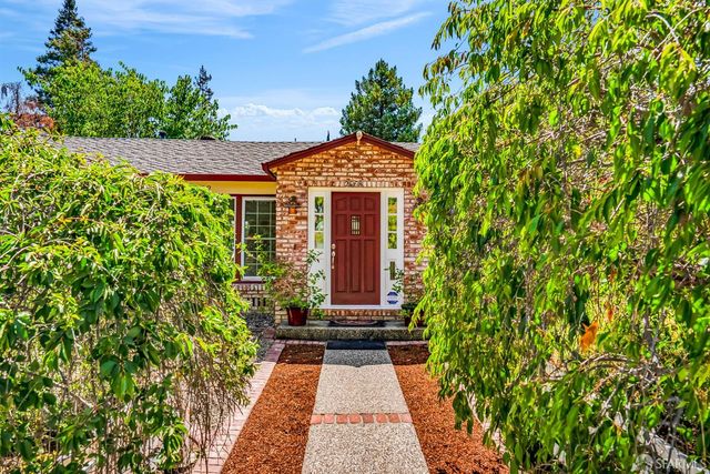 a view of a pathway with a house