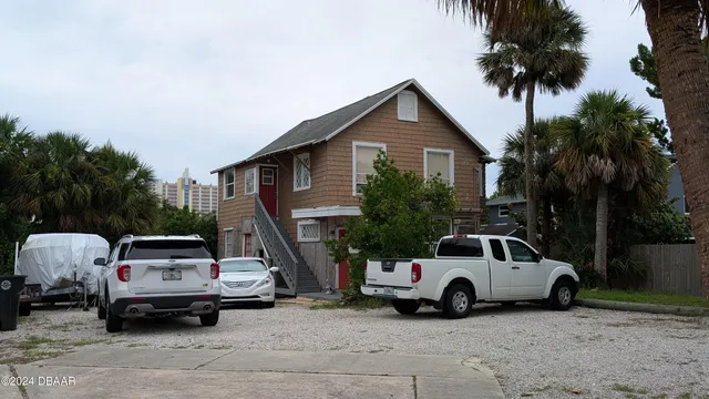 a car parked in front of a house