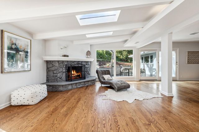 a bedroom with furniture and windows