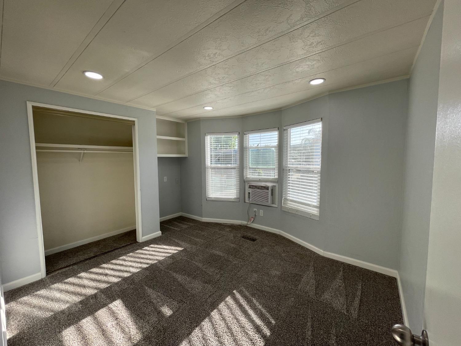 2110 Helm Avenue, Unit 16 Clovis, CA 93612 - Photo 20 of 31 a view of an empty room with a window