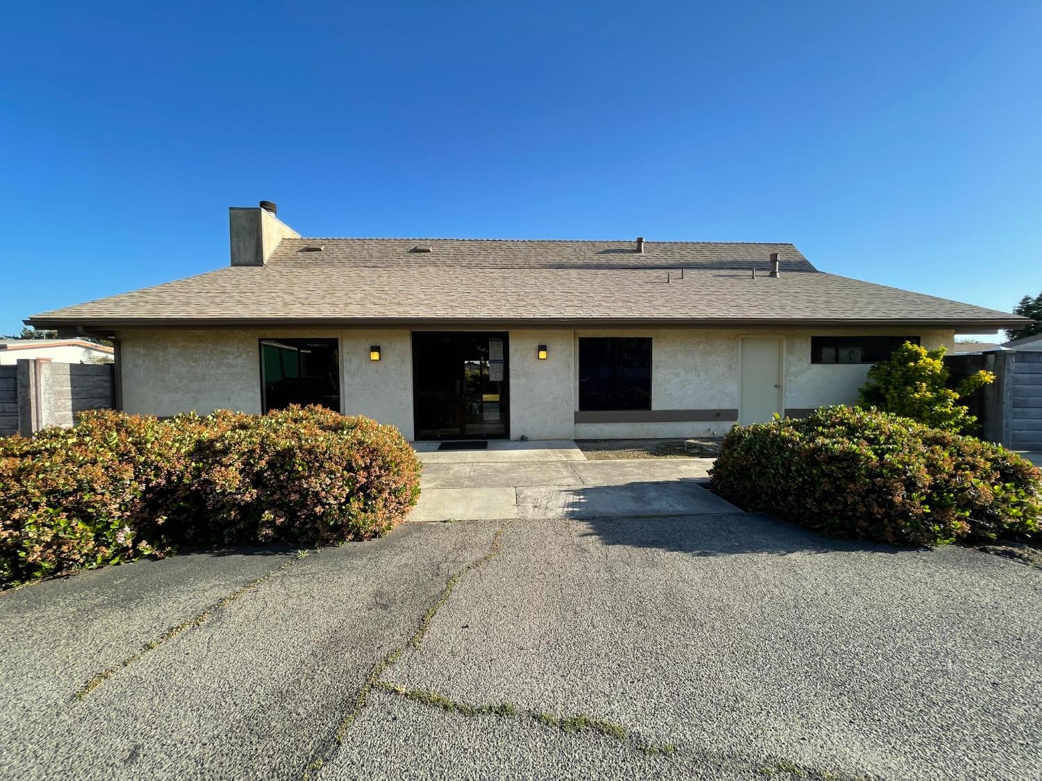 2110 Helm Avenue, Unit 16 Clovis, CA 93612 - Photo 30 of 31 a front view of a house with a garden