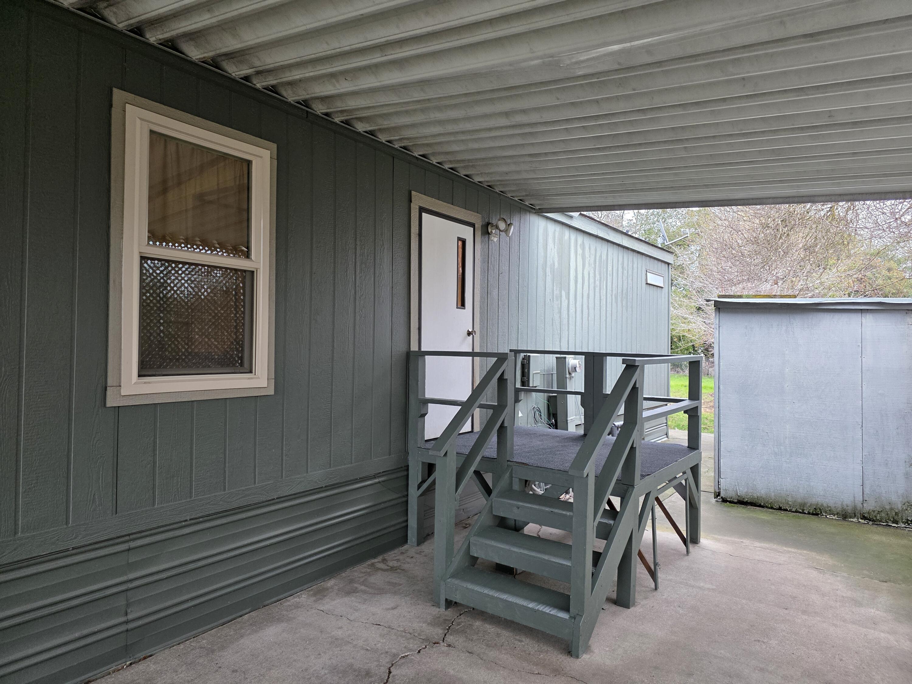 301 Freeman Road, Unit 30 Central Point, OR 97502 - Photo 17 of 26 a view of outdoor space and deck