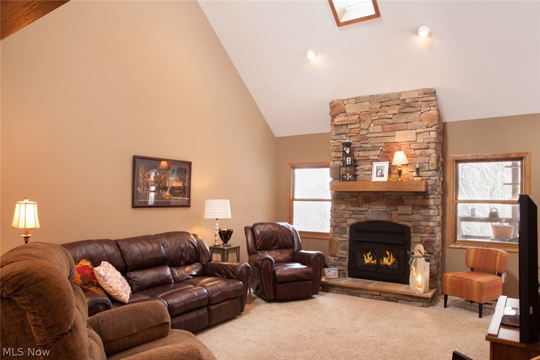 10055 Dunlap Road Cambridge, OH 43725 - Photo 5 of 28 Family room with natural gas fireplace and 22 ft ceilings