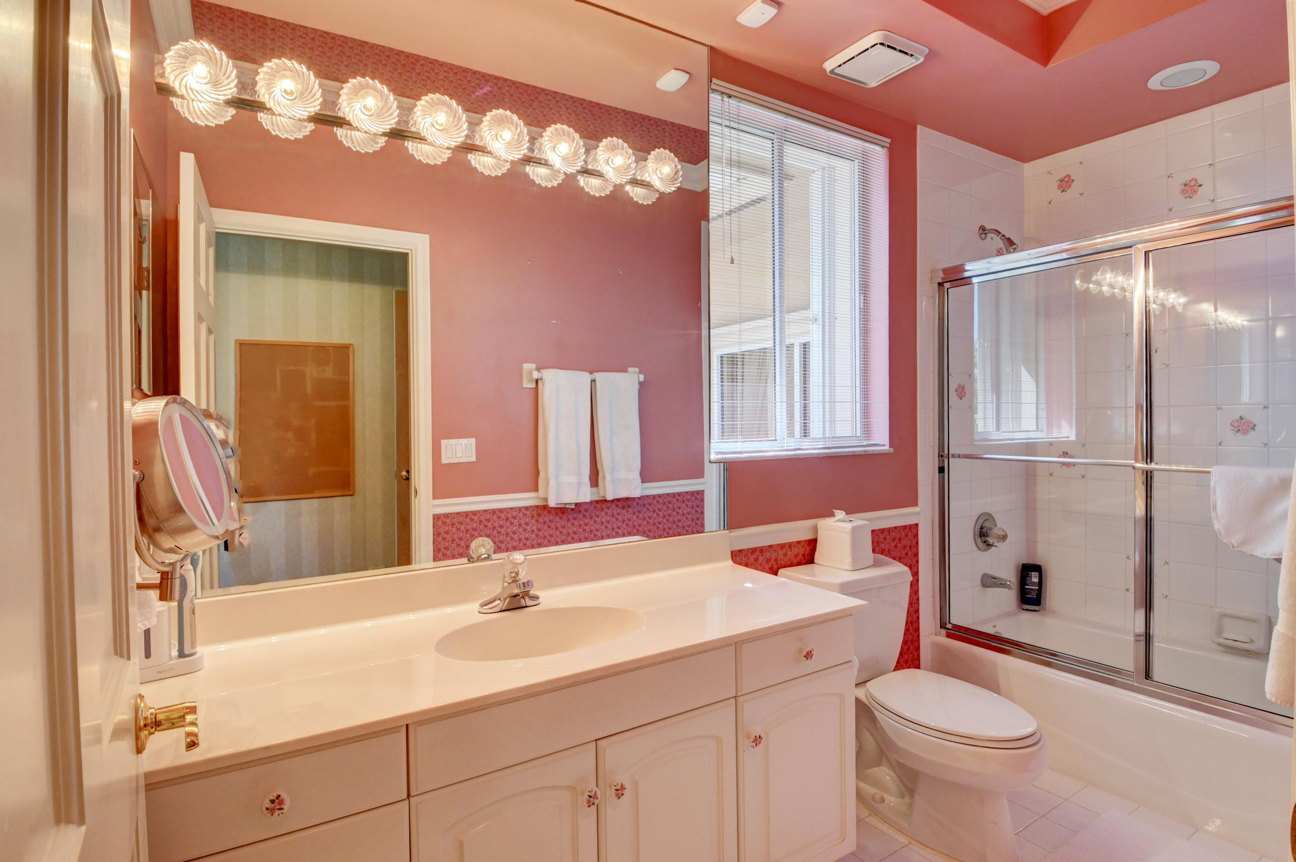 3196 Northwest 60th Street Boca Raton, FL 33496 - Photo 37 of 65 a bathroom with a sink a toilet and shower