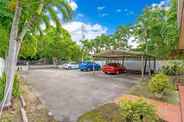 a view of car parked in front of house