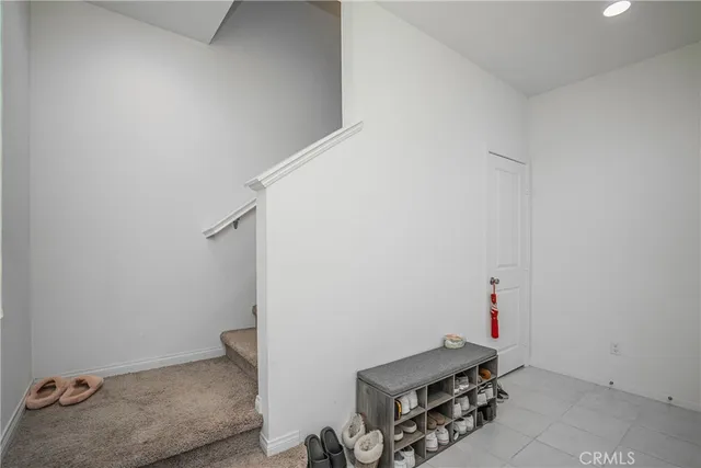 a bathroom with a sink mirror and toilet