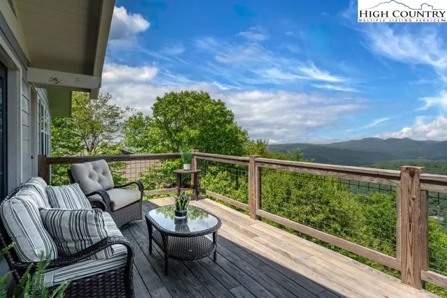 a view of balcony with furniture