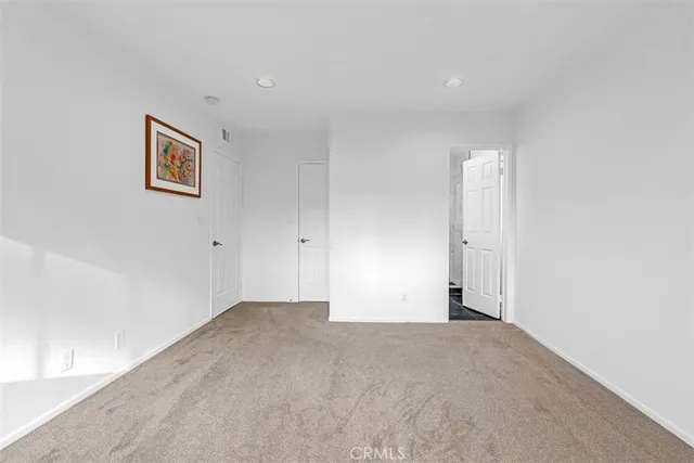 a view of a livingroom with a workspace