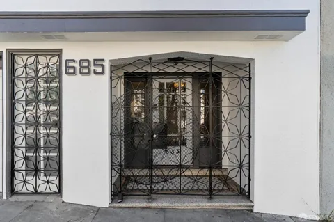 a view of a bedroom from a hallway
