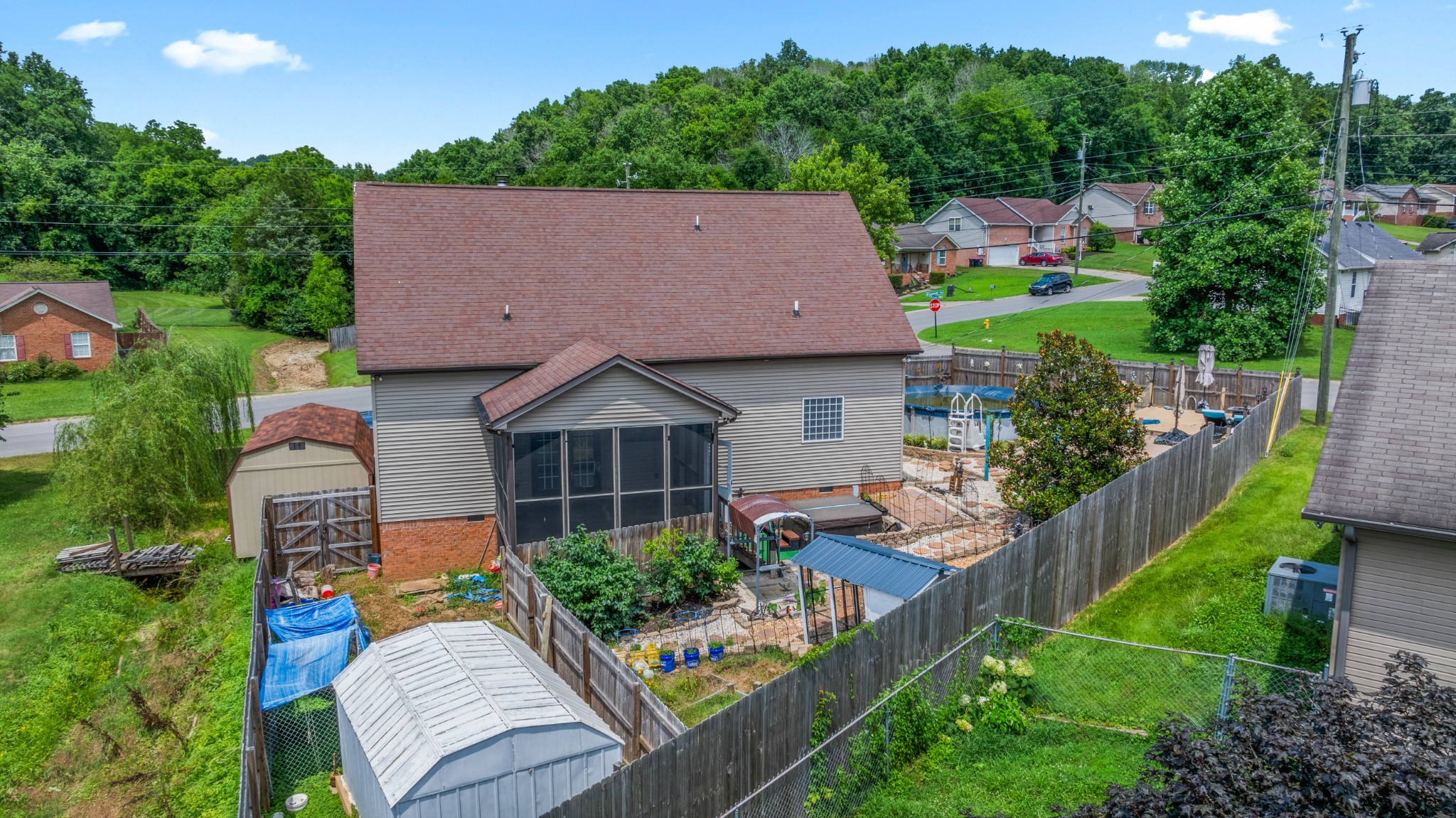 114 Cartwright Parkway Goodlettsville, TN 37072 - Photo 2 of 34 a aerial view of a house with a yard patio and fire pit