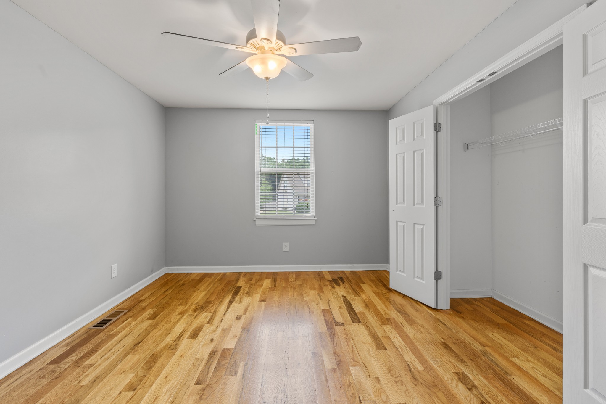 114 Cartwright Parkway Goodlettsville, TN 37072 - Photo 21 of 34 a view of empty room with wooden floor and fan