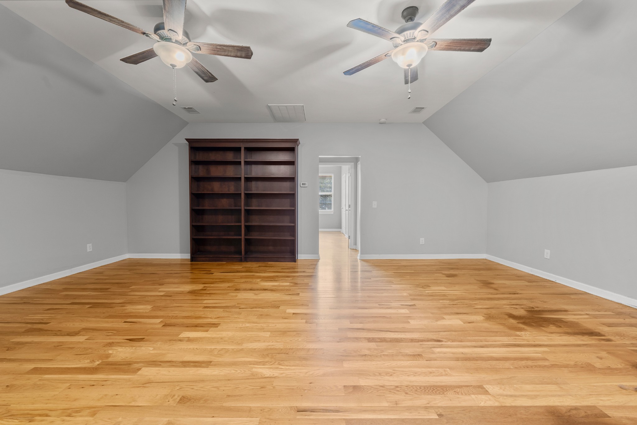 114 Cartwright Parkway Goodlettsville, TN 37072 - Photo 23 of 34 a view of an empty room with a ceiling fan and window