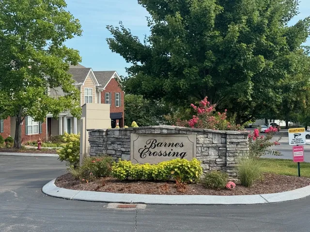 a sign on the side of a street