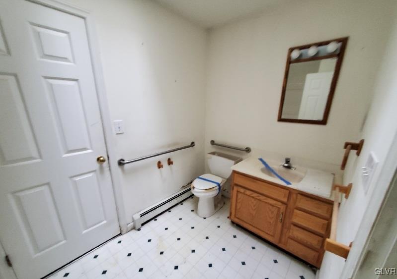 5535 Cetronia Road Allentown, PA 18104 - Photo 3 of 15 a bathroom with a sink mirror vanity and toilet